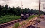 NS 7017 leads an eastbound train 